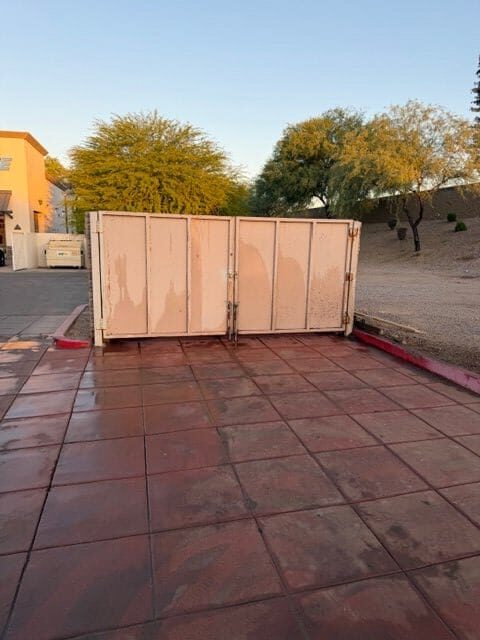 Dumpster placement coordination at commercial property